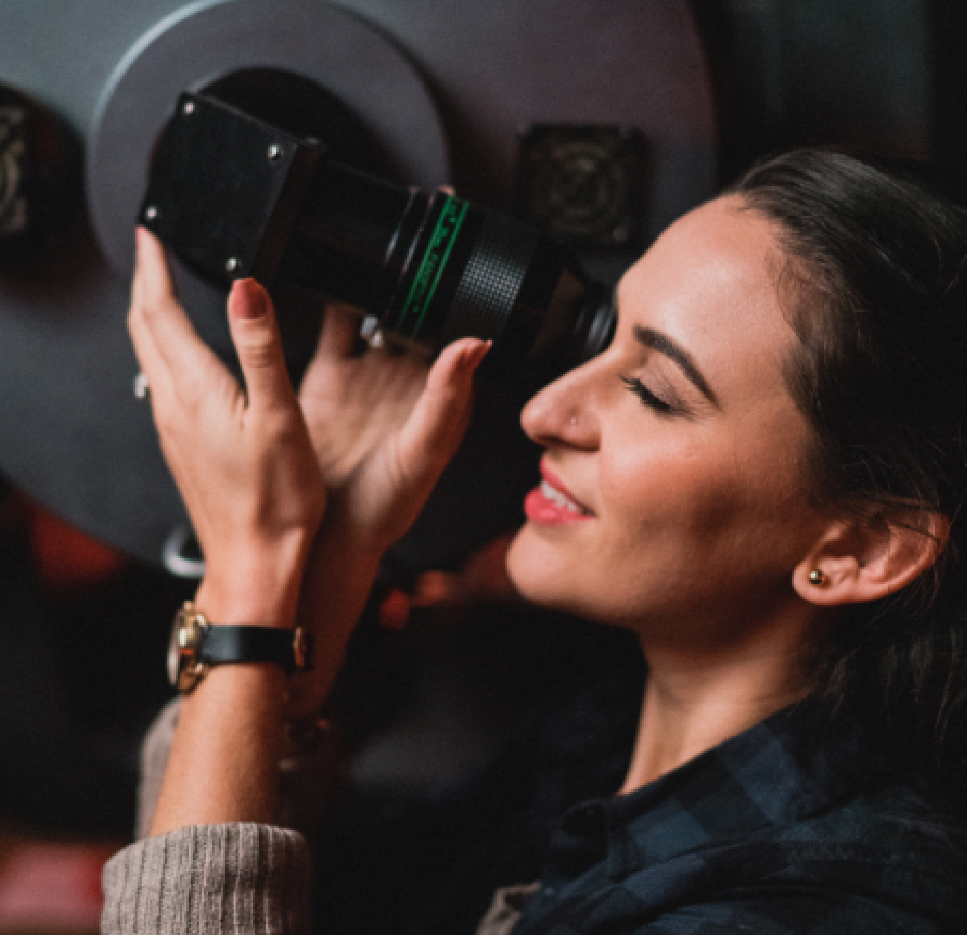 woman taking a photo with camera